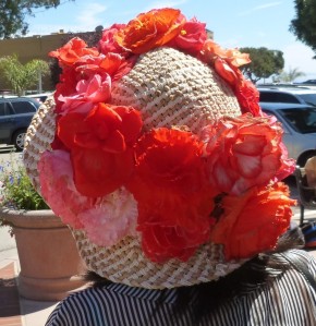 This woman let me photograph her begonia-decorated hat.